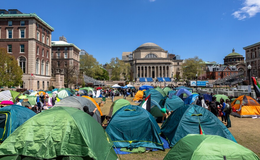 Protesters seen in tents on Columbia University's campus on April 24. The school later suspended protesters who didn't leave, and called New York City police to arrest those who occupied a building on campus.