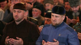 Chechen leader Ramzan Kadyrov (right) and Russian parliament deputy Adam Delimkhanov pray at a mosque in Chechnya's capital, Grozny.