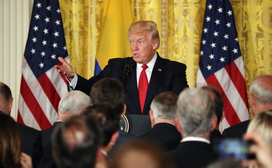 President Trump delivers remarks during a joint news conference with Colombian President Juan Manuel Santos at the White House on Thursday.