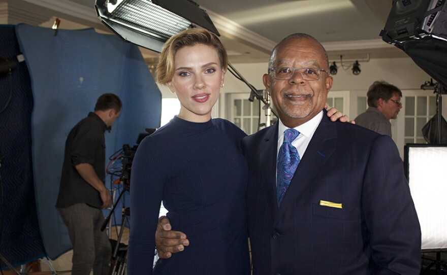 Henry Louis Gates, Jr. with Scarlett Johansson on the set of FINDING YOUR ROOTS, Season 4.