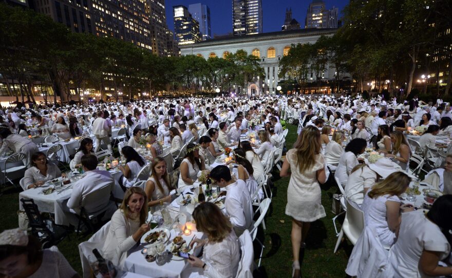 Some 4,000 guests, all dressed in white, showed up for the secret dinner party in New York City's Bryant Park.