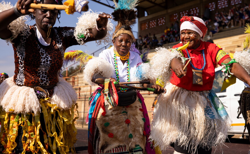 Dancers in traditional dress accompanied South Africa's Mbombela team at the opening ceremony of the grannies tournament, which involved a 15-minute walk from the home of tournament founder Beka Ntsanwisi to the stadium.