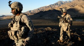 Members of the U.S. Army 1-6 Field Artillery division patrol in a small herding community  in Nuristan Province, Afghanistan. 