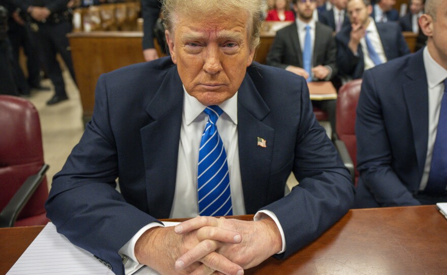 Former U.S. President Donald Trump and attorney Emil Bove attend his trial for allegedly covering up hush money payments at Manhattan Criminal Court on May 13, 2024 in New York City.