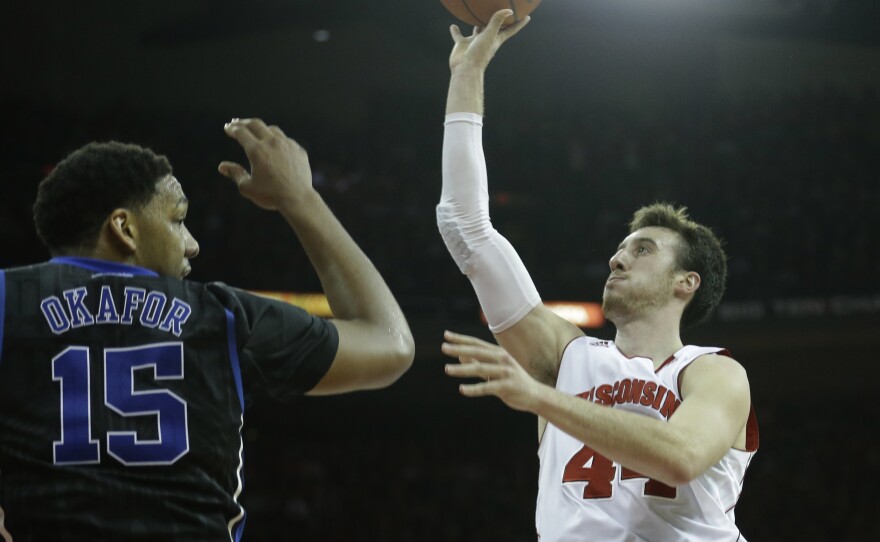 Frank Kaminsky of the Wisconsin Badgers will face off against the Duke Blue Devils' Jahlil Okafor in Monday night's NCAA title game. When the teams played in December, Duke won, 80-70.