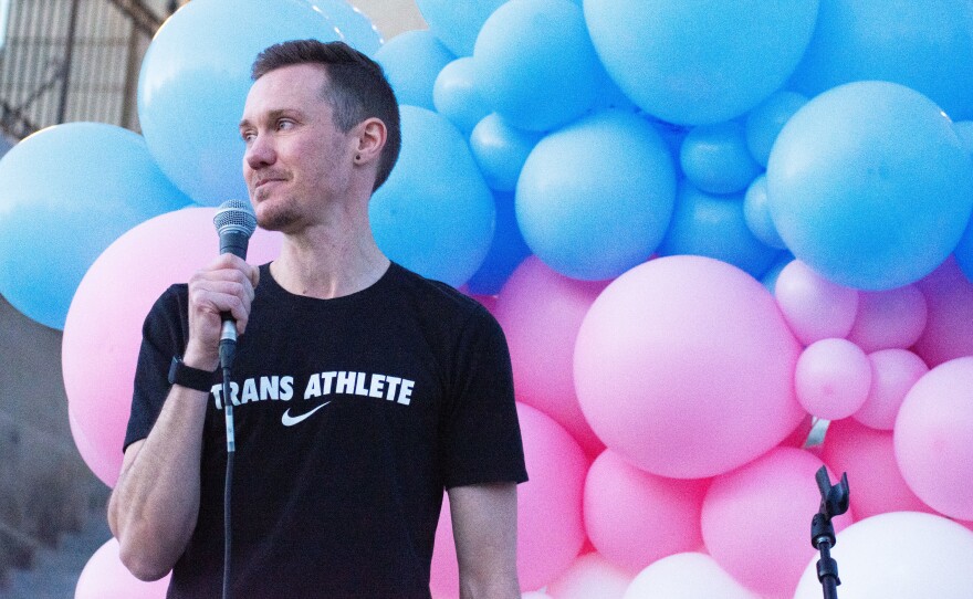 Chris Mosier, the first known transgender person to qualify for an Olympic trial, joined protesters in Boise, Idaho, to push back against legislation targeting transgender residents.