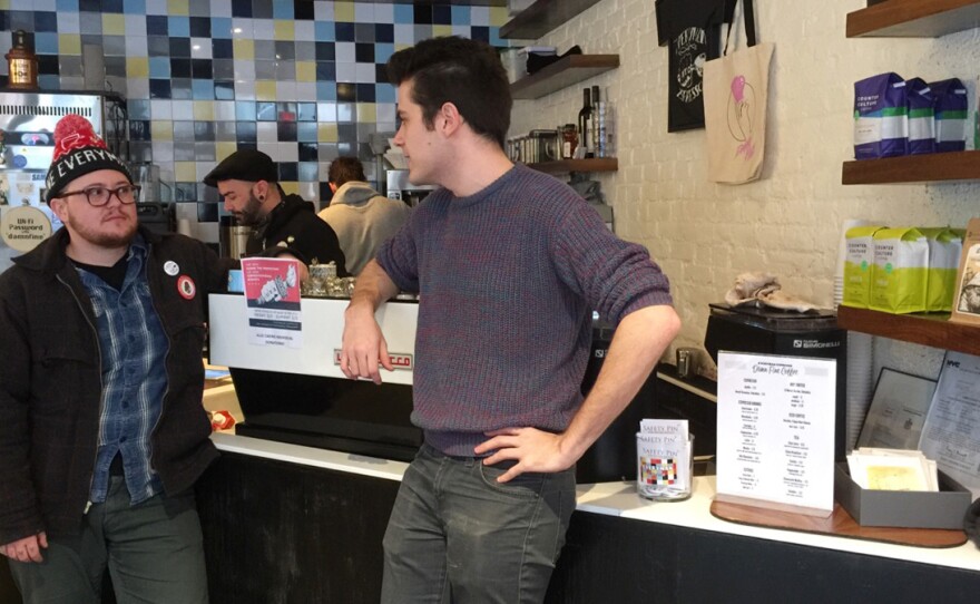 Owner Sam Penix (left) talks with manager Eric Grimm at the Everyday Espresso cafe.