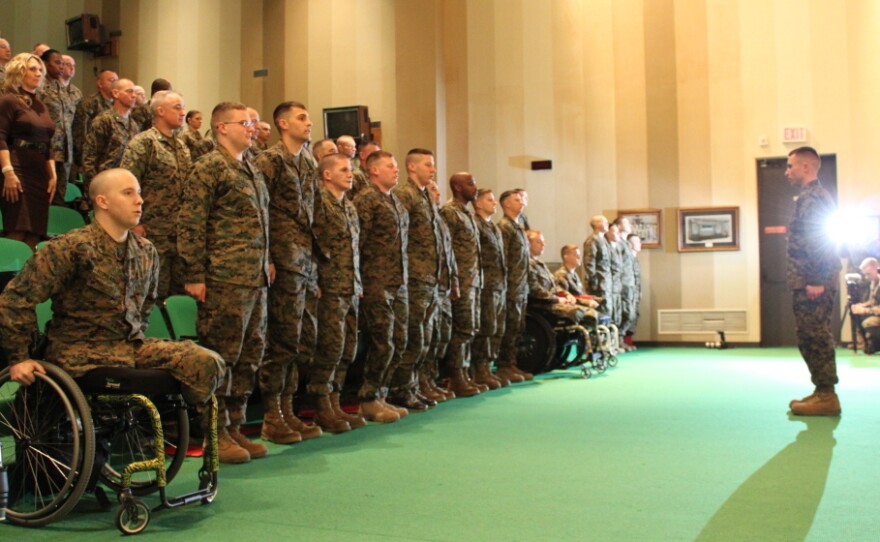 Wounded Warrior Battalions have been set up to help troops returning from combat recover from their injuries. But recent Pentagon reviews have found a pattern of overmedication in such battalions. Here, Marines assigned to Wounded Warrior Battalion East at Walter Reed National Military Medical Center in Bethesda, Md., graduate from a training course in January.