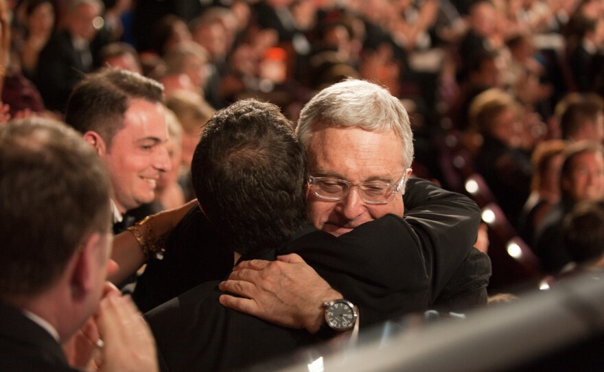 Randy Newman on his way to collect his second Best Song Oscar.