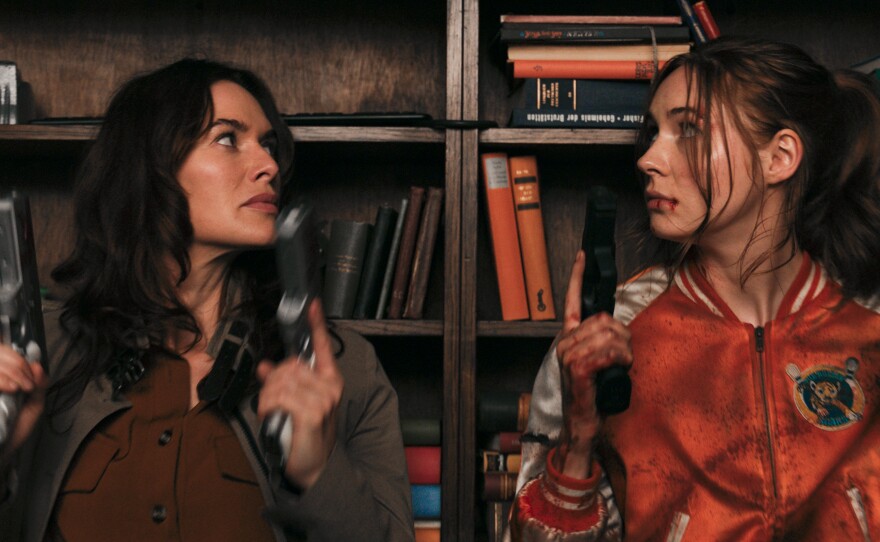 Lena Headey and Karen Gillan in Netflix's <em>Gunpowder Milkshake</em>.
