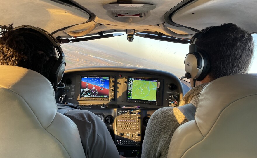 Ricki Foster with flight instructor Aiden Zabiegalski.