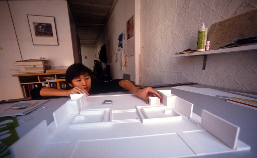 Maya Lin working on a model for memorial in her studio in Manhattan, New York, 1989.