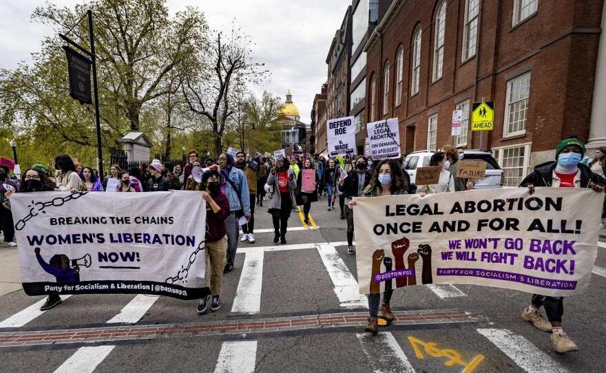 <strong>BOSTON</strong>: Protesters begin marching down Park Street during the Defend Abortion Rights rally at the Massachusetts State House.