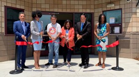  Mayor Todd Gloria with Assemblywoman Dr. Akilah Weber (far right) and Councilwoman Monica Montgomery Steppe (second to left) along with community members during a ribbon-cutting ceremony for the grand opening of the Bay Terraces Community and Senior Center, July 30, 2021.