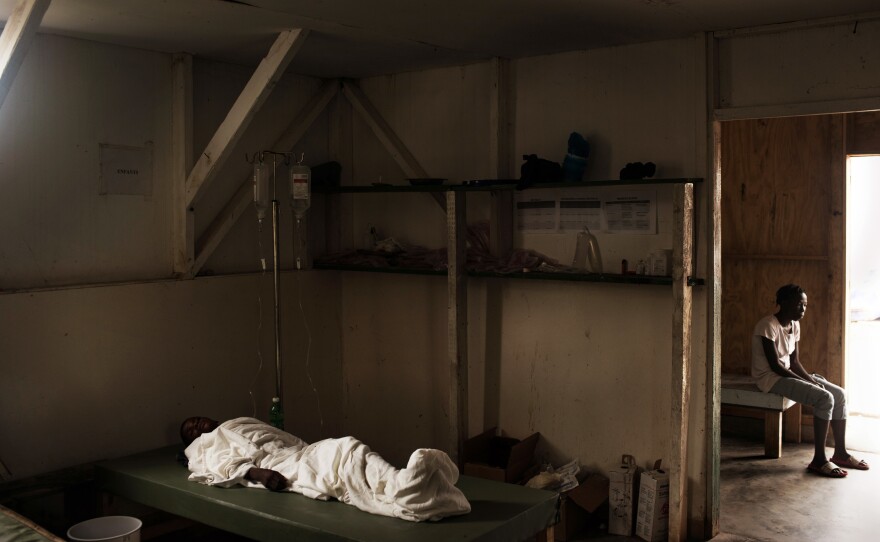 Fritznel Xavier, 15, receives a re-hydration IV at a Cholera Treatment Center (CTC) in Jeremie, Haiti, one of the cities hardest hit by the cholera epidemic. November 18, 2016