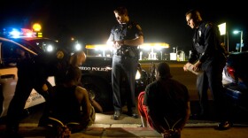 Gang suppression officers arrest documented gang members during a March 2010 curfew sweep. San Diego police haven't choked off the flow of new gang recruits, documenting more than 400 new gang members since 2007.