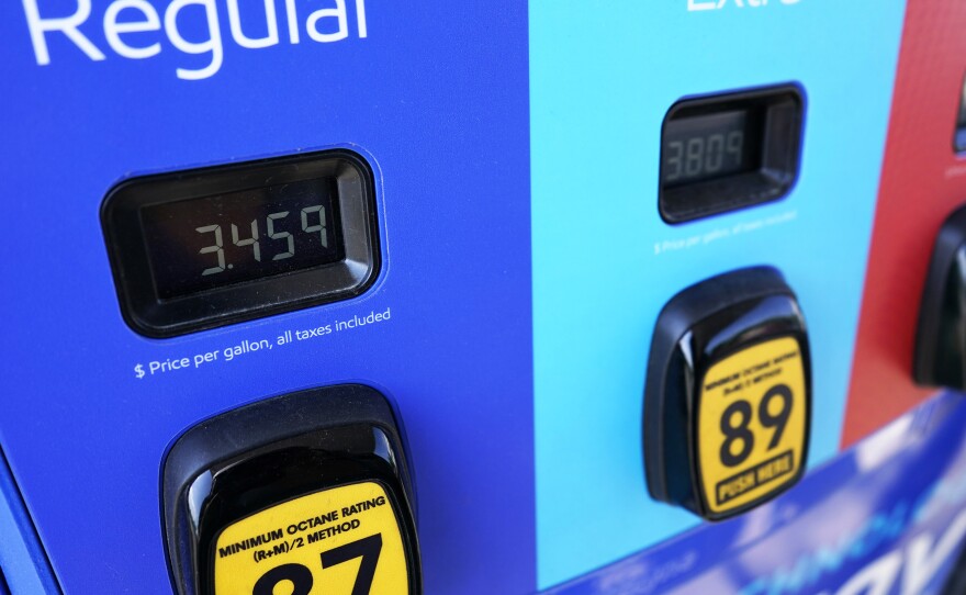 Gas prices are seen at a gas station in Vernon Hills, Ill., on June 11, 2021. Crude prices continued to gain on Thursday even after the U.S. and 30 other countries announced a coordinated release of oil from their reserves.