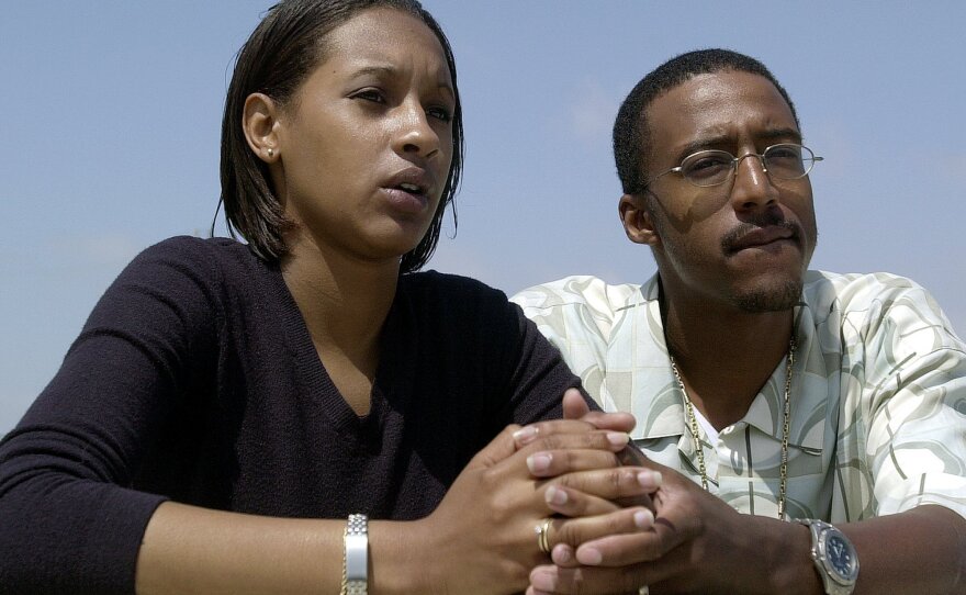 Tameka Jones, left, with Tieray Jones, talk about the ordeal of her missing 2-year-old son, Jahi Turner, May 6, 2002.