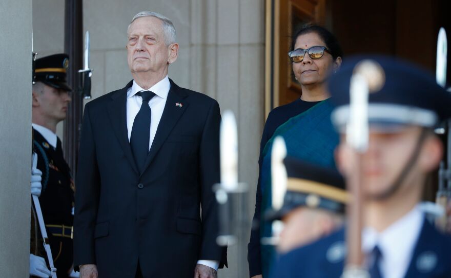 Then-Defense Secretary Jim Mattis stands with the defense minister of India, Nirmala Sitharaman, moments after the Indian dignitary arrived at the Pentagon earlier this month.