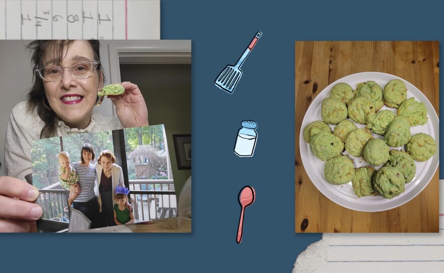 Allison Stines holds a photo of her family while she eats a a family-favorite cookie: Martian droppings.