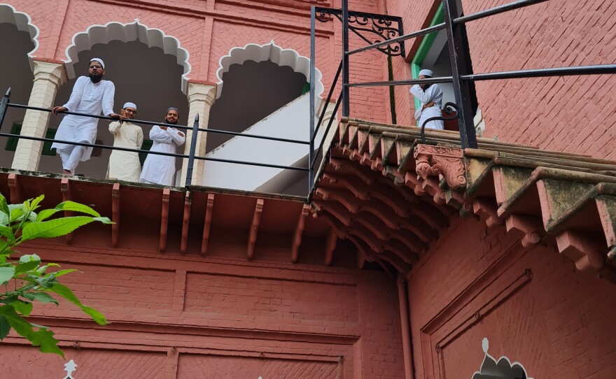 Students mill around between classes at the Darul Uloom seminary. In the 19th century, this seminary founded the Deobandi school of Islam.