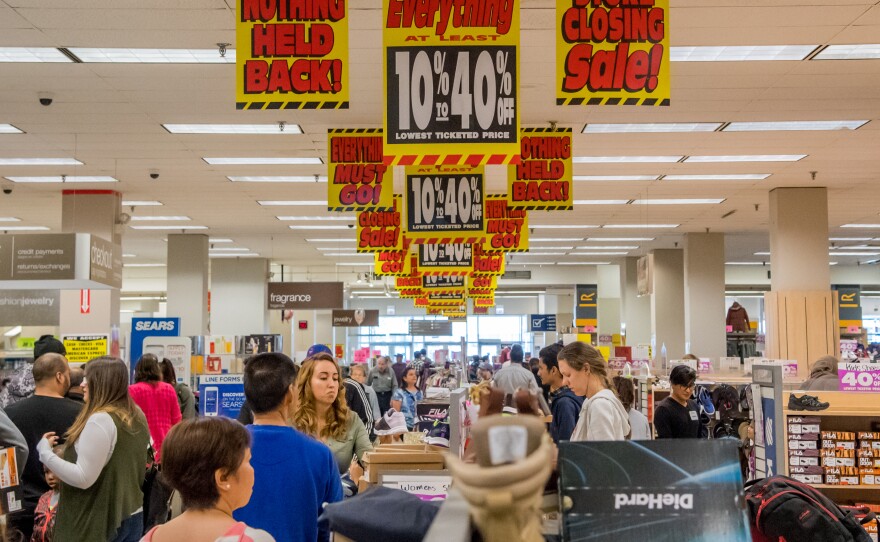 Sears Holdings Corp., which operates Sears and Kmart, said Thursday that it is closing 72 more of its stores. Here, shoppers look for deals at the last remaining Sears store in Chicago before it closes this summer.