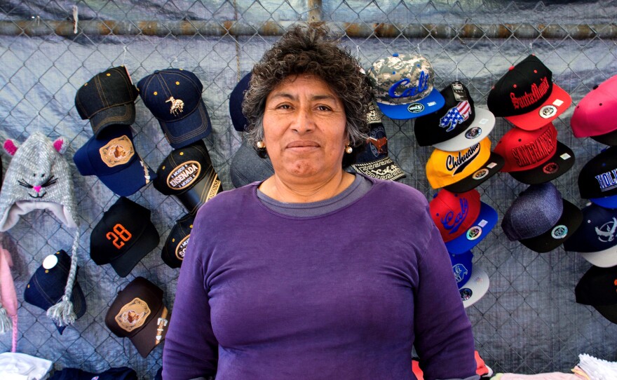 Merced is a vendor in the piñata district. She is worried that the city council's plan for a legal permitting system for sidewalk vendors, as proposed, will severely limit how many vendors can be on a given sidewalk, leaving many without a place to do business.