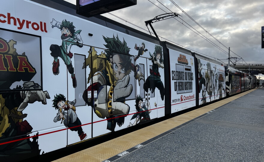 An MTS trolley wrapped in an advertisement for the anime TV show "My Hero Academia" is shown on June 30, 2026.