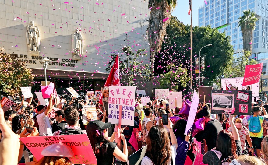 Confetti flies as protestors are seen at the #FreeBritney Termination Rally on November 12, 2021 in Los Angeles.