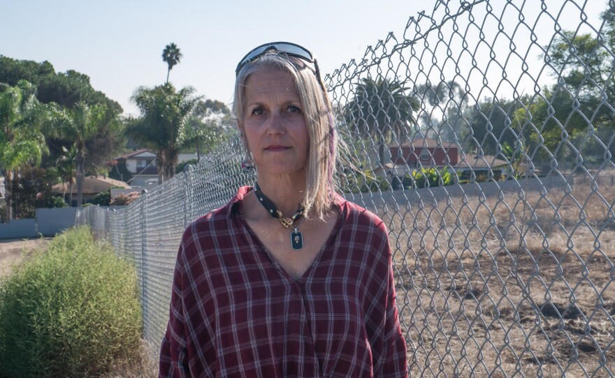 Rachel Hayes stands for a portrait outside of the CalTrans lot at the corner of Sweetwater Road and Troy Street on Oct. 28, 2025.