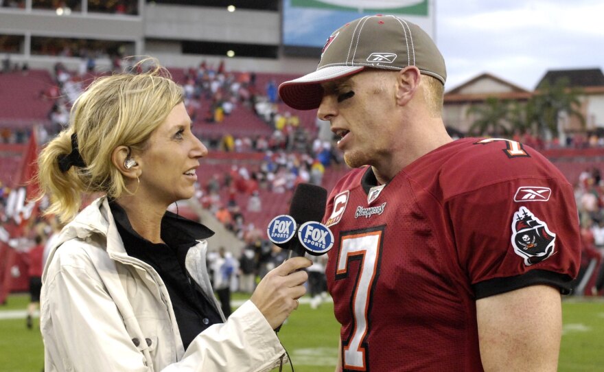 FOX sideline reporter Laura Okmin talks with quarterback Jeff Garcia of the Tampa Bay Buccaneers in a 2008 game against the New Orleans Saints.