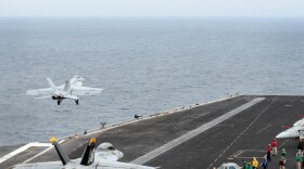 An F/A-18F Super Hornet from the Jolly Rogers of Strike Fighter Squadron (VFA) 103 prepares to launch from the aircraft carrier USS Dwight D. Eisenhower in 2012.