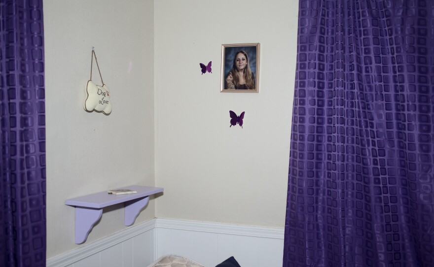 Crystal Kirk, 12, keeps a framed photo of her mother, Amber Kirk, above her bed in her home in Mulvane, Kan. Crystal and her two siblings have lived with their grandmother since 2011, when their mother was given a life sentence for possession <strong> </strong>and endeavoring to manufacture methamphetamine.