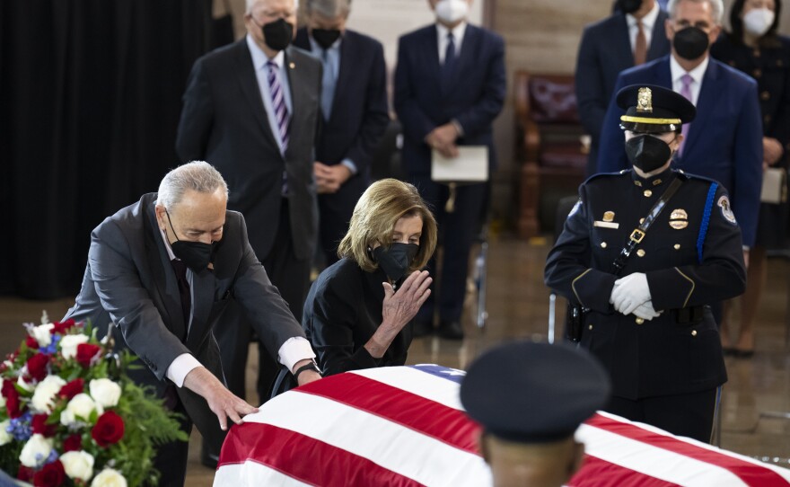 House Speaker Nancy Pelosi and Senate Majority Leader Charles Schumer pay their respects at Harry Reid's casket.