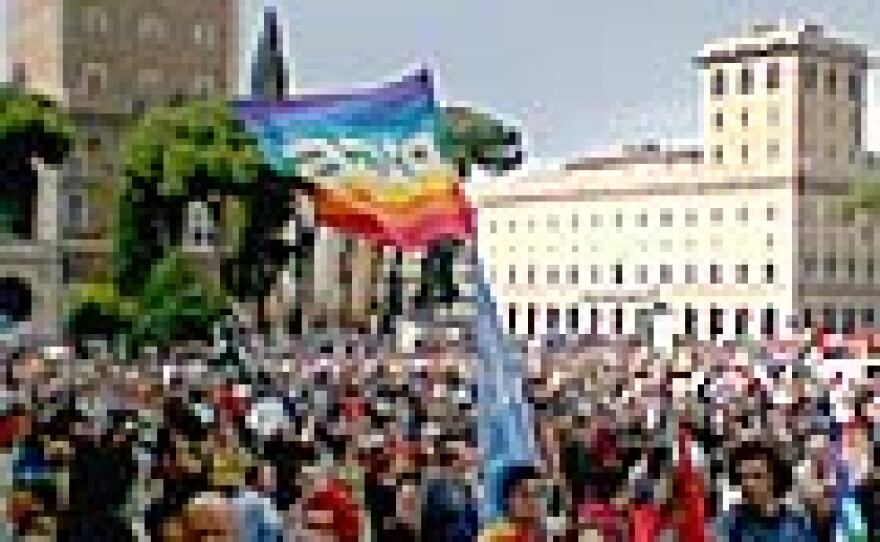 Anti-war protesters march through the historic Piazza Venezia during President Bush's visit to Rome.