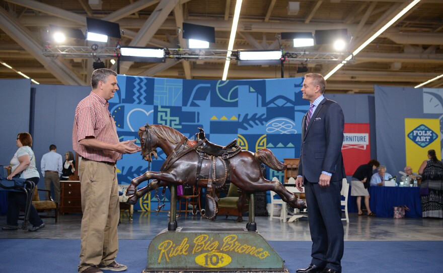 Brian Witherell (right) appraises “Big Bronco” coin-operated horse, ca. 1952, in Cleveland, Ohio. ANTIQUES ROADSHOW “Kids Stuff” airs Monday, November 3 at 8/7C PM on PBS.