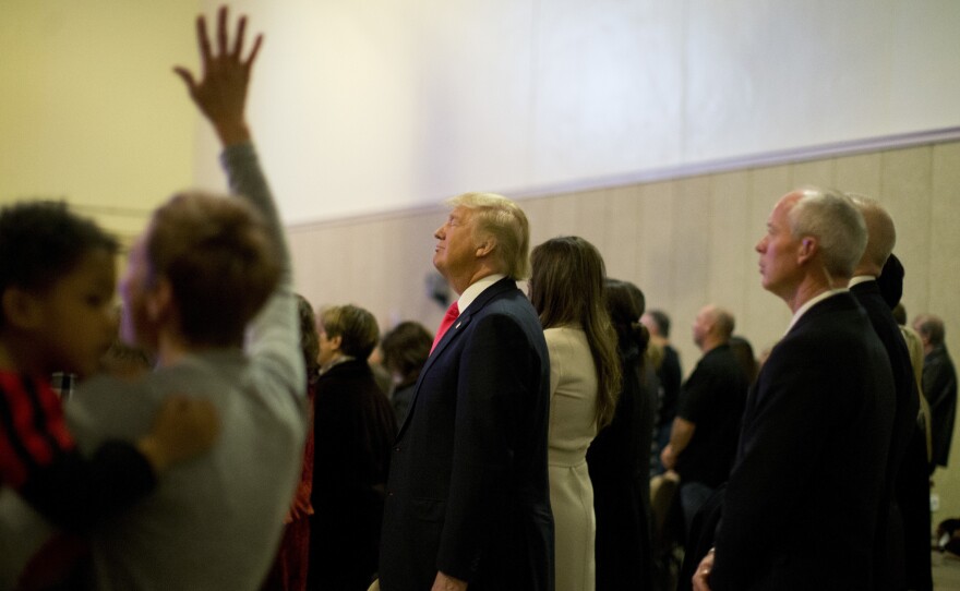 Republican presidential nominee Donald Trump attends a Sunday service at First Christian Church Council Bluffs, Iowa in January.