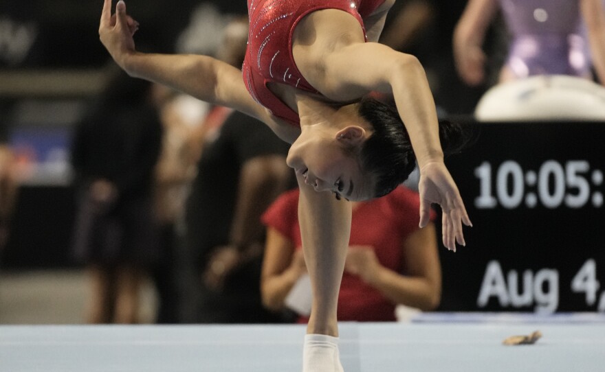Suni Lee practices on the floor exercise on Friday at the U.S. Classic.
