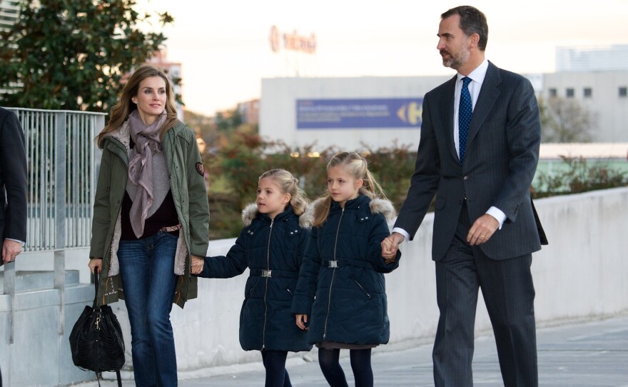 Spain's Princess Letizia and Prince Felipe, with their daughters Princess Sofia (left) and Princess Leonor, visit King Juan Carlos of Spain at the Quiron University Hospital on Nov. 22, 2013 in Alarcon, Spain. The king abdicated on Monday and Felipe will become the new monarch.