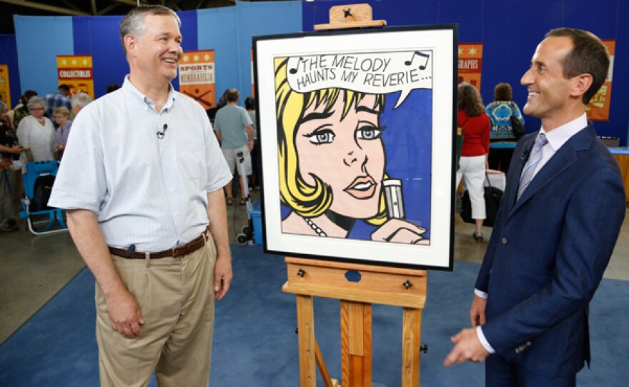 Todd Weyman (right) appraises a 1965 Roy Lichtenstein screenprint for $300,000 in Kansas City, Missouri.