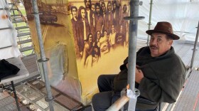 Artist and activist Victor Ochoa Sr. at work on a mural in this undated photo.