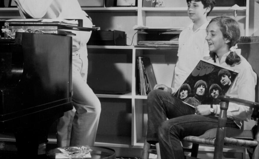 Leonard Bernstein with daughter Jamie and son Alexander, listening to The Beatles.
