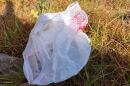 Thin single-use plastic bags, like this one in Mission Valley, litter roadsides all around San Diego County on July 8, 2020.  