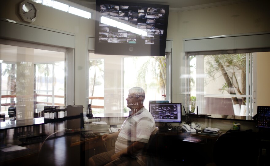 Fonseca sits in his office, where security cameras monitor all corners of the deserted resort. He says last year the resort had 47 employees. Now there are 18.