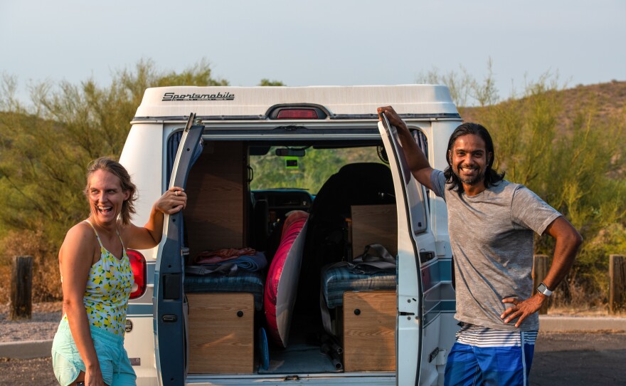 At the Salt River, Rachel and Prashan Srinivasan show off the interior of their "pandemic purchase", a 1990s van with a pop-up top and room for sleeping. They bought the van to have a COVID-safe space to travel around in.