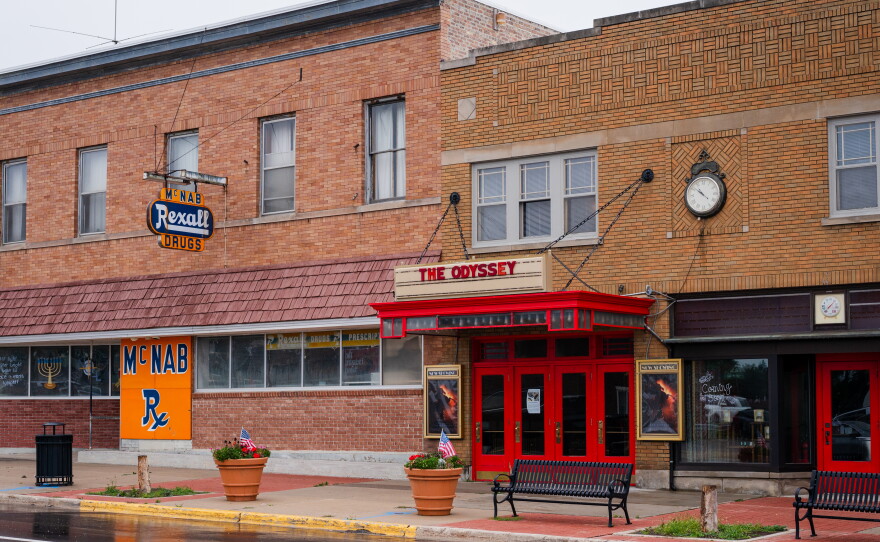 Downtown Newberry, Mich. The single-screen Tahqua Land Theater plays new movies, while the neighboring drug store has closed.