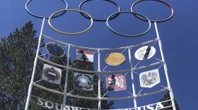 The Olympic rings stand atop a sign at the entrance to the Squaw Valley Ski Resort in Olympic Valley, Calif., July 8, 2020. 