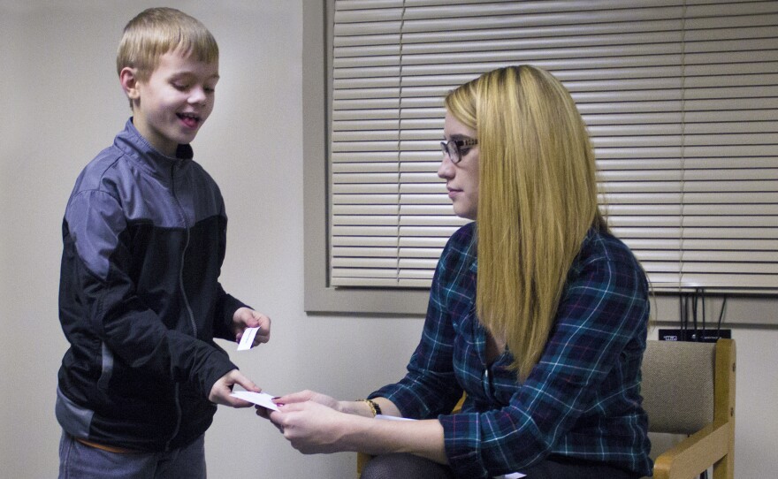 Shaw, 8, plays an improv game with Erin McTiernan, an Indiana State University doctoral student. Shaw is a participant in an improv class at Indiana State University for children with high functioning autism.