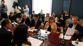 House Minority Leader John Boehner (R-OH) (L) and House Minority Whip Eric Cantor (R-VA) (C) liksten to health care concerns of small business owners at the US Capitol July 28, 2009 in Washington, DC. Small business owners were invited to a roundtable meeting to discuss health care reform.