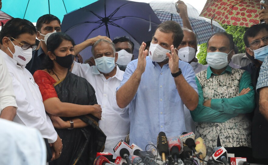 Congress party leader Rahul Gandhi, with leaders of opposition parties, addresses reporters on the Pegasus spyware project, outside the Parliament in New Delhi on July 28, 2021. Opposition parties asked whether the Indian government had bought Pegasus, a hacking software developed by the Israeli company NSO Group.